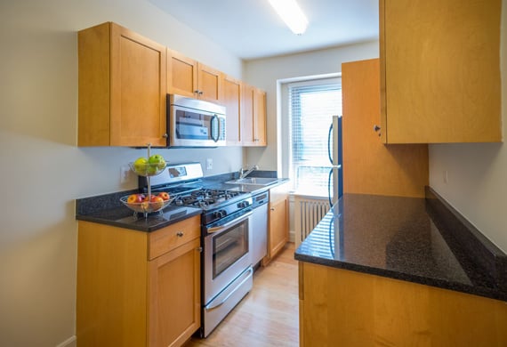 A Small Kitchen In An Apartment